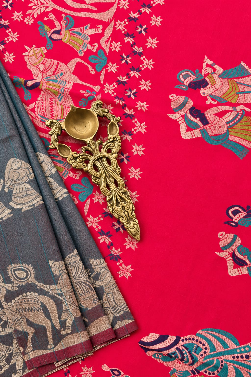 Vamika charcoal grey and rani pink semi raw silk saree with figurative resham weaving by Tattva Crafted Elegance