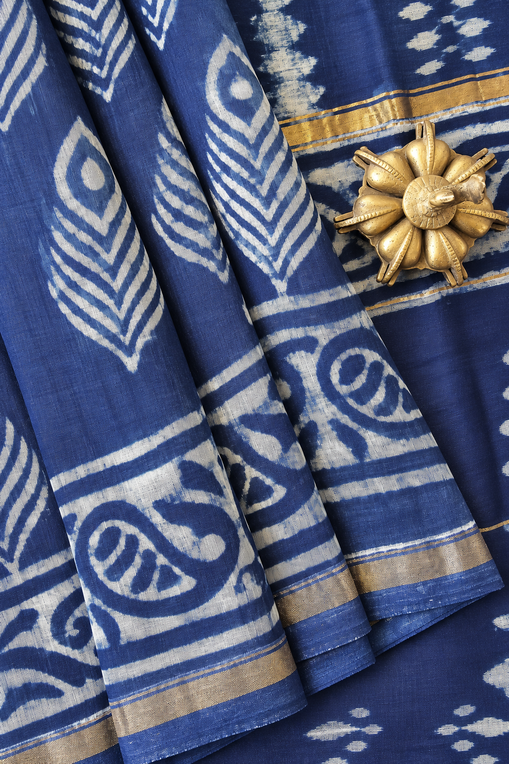 Ahaana indigo silk cotton saree with traditional paisley motifs, leafy patterns and golden zari border by Tattva Crafted ElegancE