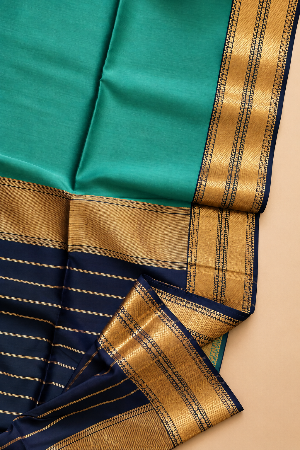 Tarang Maheshwari silk cotton saree in sea green with traditional black and gold zari detailing.